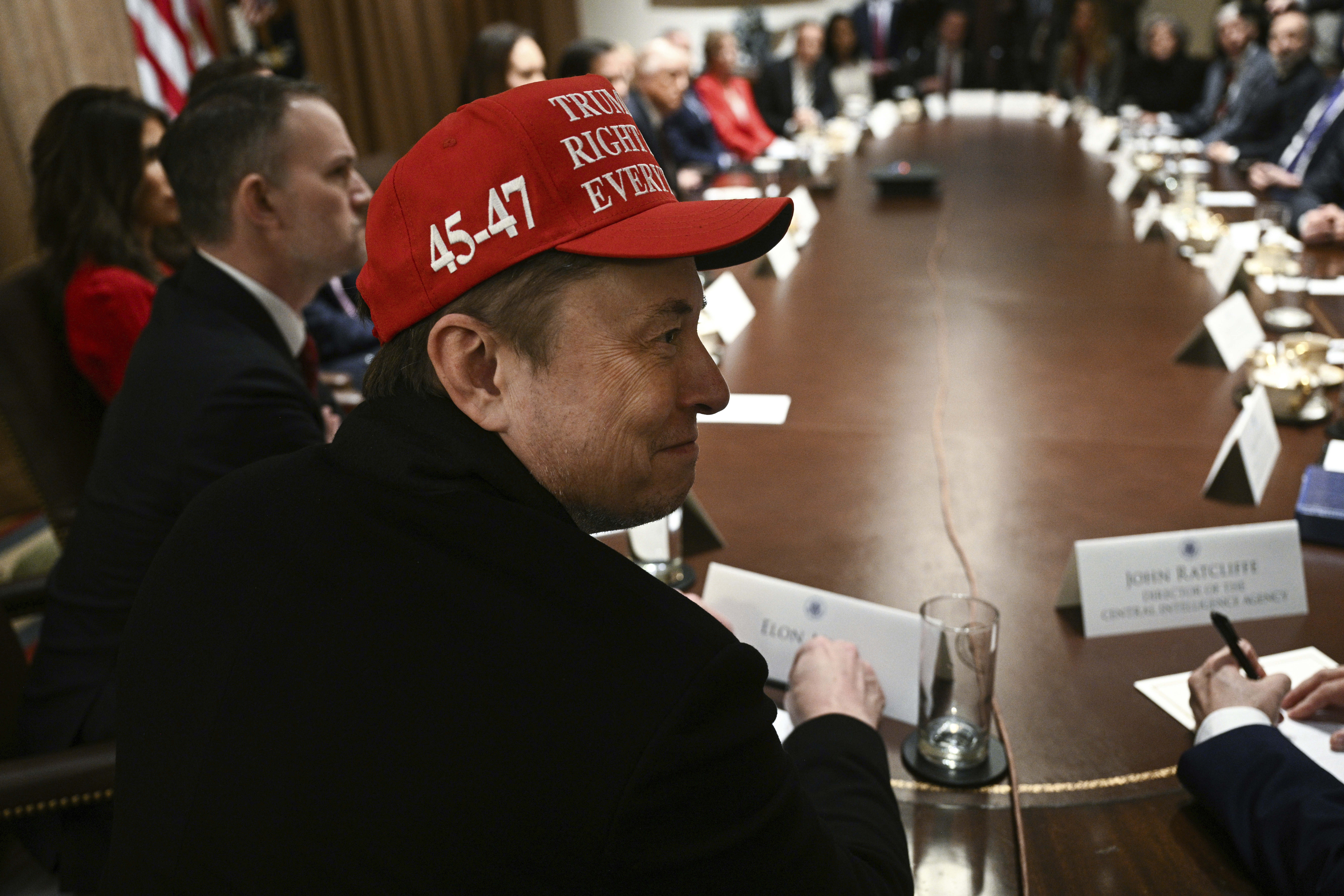 Elon Musk listens during a cabinet meeting with President Donald Trump in the White House. Elon Musk listens during a cabinet meeting with President Donald Trump in the White House.